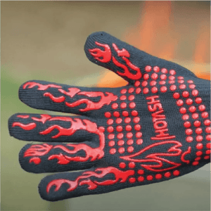 A durable black BBQ glove with vibrant red non-slip dots and flame accents, designed for handling high heat.