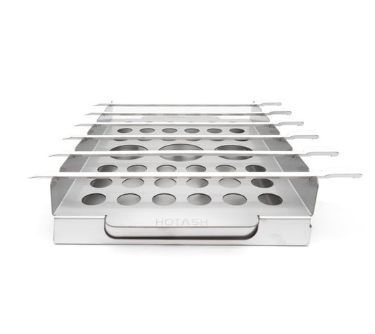 Six skewers on the grill rack