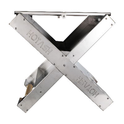 Angled perspective of Atlas X Portable Charcoal Grill highlighting grilling surface and stability