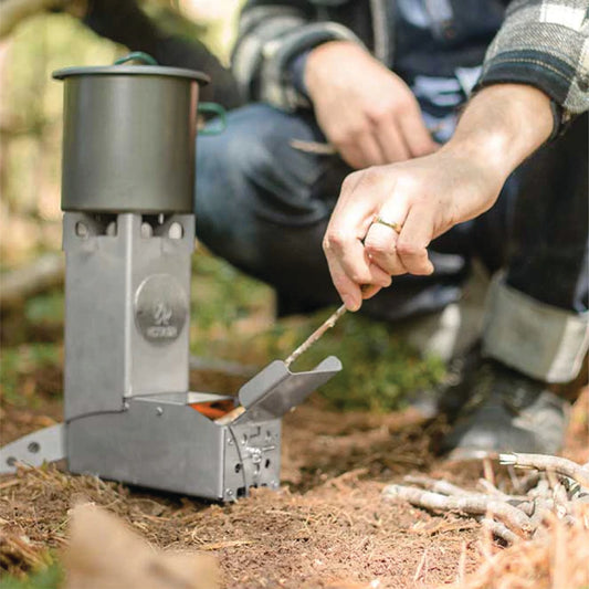 Hot Ash Stainless Steel Rocket Stove set up outdoors for cooking